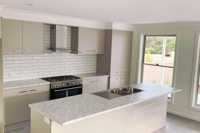This is an example of a contemporary kitchen in Wollongong.