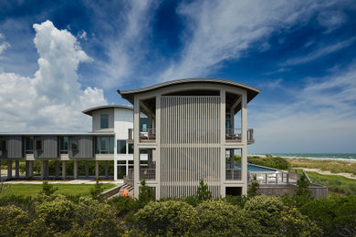 Inspiration for a contemporary house exterior remodel in Other