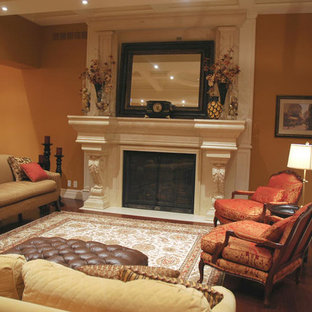 75 Most Popular Traditional Living Room with Orange Walls Design Ideas