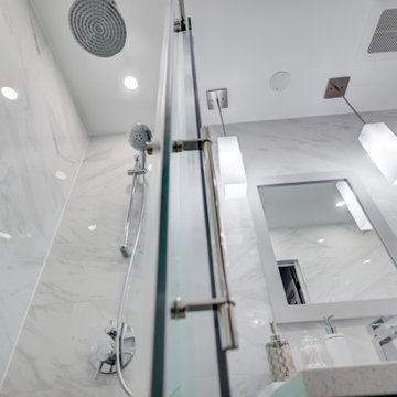Ceiling shower head, sliding shower glass doors, pendant lights