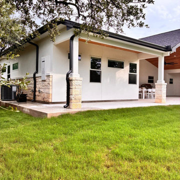 Black seamless gutter installation - Custom home in Georgetown, Texas