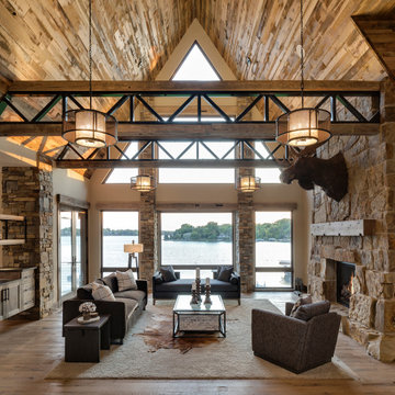Reclaimed Wood Ceiling Paneling and Timber Trusses in a Contemporary Lake Home