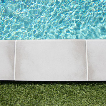 Une piscine en béton 6x3 m