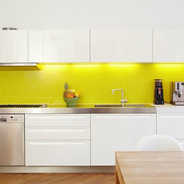 Modern kitchen with yellow mosaic backsplash