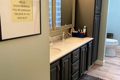 Inspiration for a mid-sized transitional kids' vinyl floor, beige floor and double-sink bathroom remodel in Philadelphia with blue cabinets, a one-piece toilet, blue walls, an integrated sink, quartz countertops, white countertops and a built-in vanity