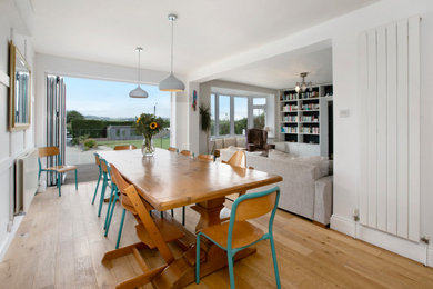 Contemporary dining room in Devon.