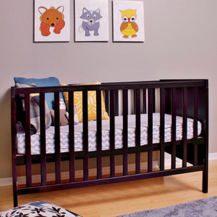 Example of a small minimalist bamboo floor nursery design in Tampa with gray walls