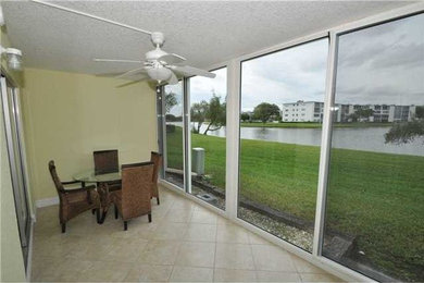 Mid-sized transitional ceramic tile sunroom photo in Miami with a standard ceiling