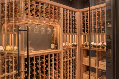 Example of a trendy wine cellar design in Boston