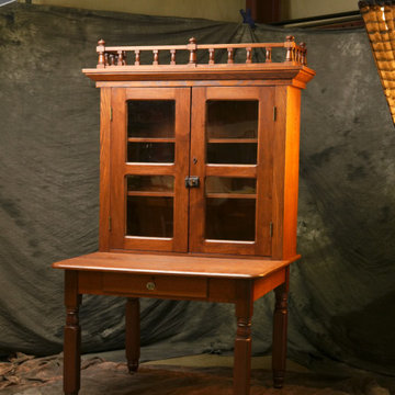 Trim Repair and Full Restoration: Documented 1894 Bookcase on Table