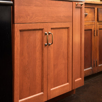Cherry Kitchen with Steel and Butcher Block Countertops