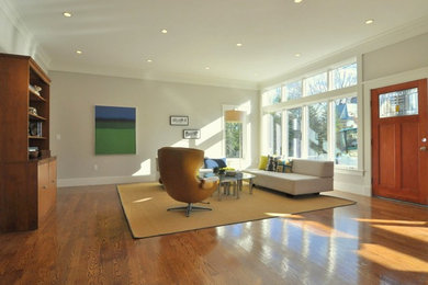 Example of a transitional family room design in Boston