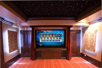 Inspiration for a mid-sized transitional enclosed home theatre in Chicago with medium hardwood floors, a projector screen and brown floor.