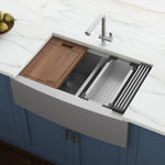 Ruvati - Ruvati RVH9201 Apron Front 16 Gauge 33" Kitchen Sink Double Bowl - Ruvati’s Verona collection combines the best of both worlds: a functional workstation sink and a bold stainless steel apron-front installation. The workstation design features a built-in ledge that provides a platform for Ruvati’s unique accessories. Each sink in the Verona collection features the perfect trio: a solid hardwood cutting board, a stainless steel colander, and Ruvati’s patented foldable drying rack. Made of premium, commercial-grade 16-gauge stainless steel, each sink is extremely durable and easy to clean. With the Verona collection, you can do all your prep work on top of your sink and keep your countertops free of mess.