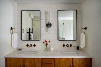 Example of a mid-sized minimalist master white tile and porcelain tile porcelain tile, black floor and double-sink alcove shower design in Boston with flat-panel cabinets, brown cabinets, a bidet, white walls, an undermount sink, quartz countertops, a hinged shower door, white countertops, a niche and a freestanding vanity