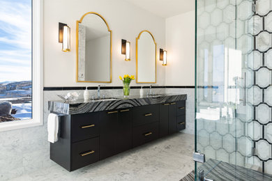 Bathroom - contemporary marble tile marble floor and double-sink bathroom idea in Salt Lake City with dark wood cabinets, an undermount tub, white walls, an undermount sink, granite countertops, a hinged shower door, multicolored countertops and a floating vanity