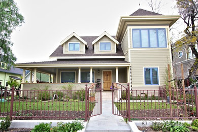 Inspiration for a mid-sized transitional gray two-story vinyl gable roof remodel in San Luis Obispo