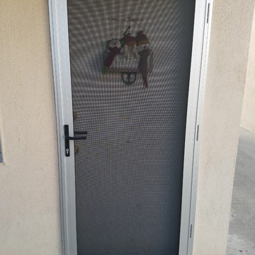 8 Mill Finish Security Screen Doors on an apartment building in Long Beach
