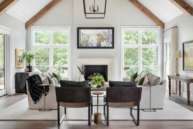 Example of a farmhouse living room design in Nashville