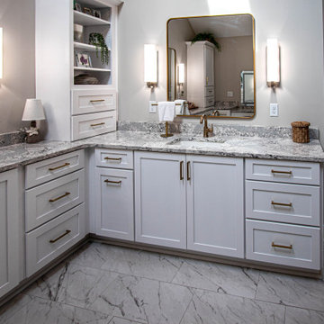 Luxurious White Bathroom with Barrier Free Shower, Make-up area and Storage