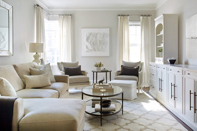 Example of a transitional living room design in New York