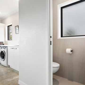 Complete Home Makeover - W/C & Laundry in Garage