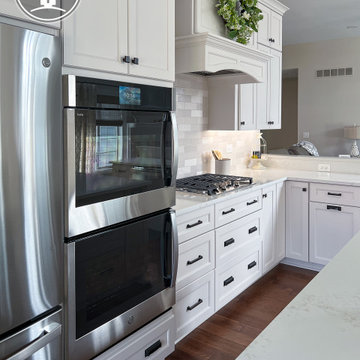 Bright & Timeless Kitchen Reorientation with Fireplace Refresh