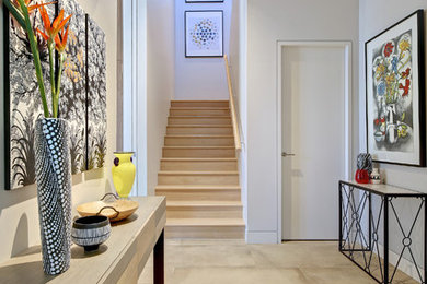 Inspiration for a large contemporary hallway in Adelaide with white walls, grey floor and porcelain floors.