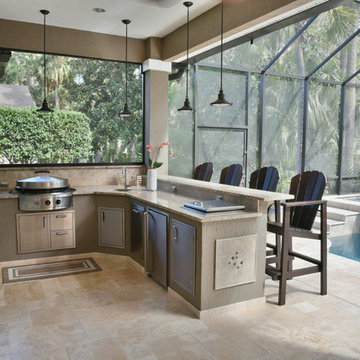 Outdoor kitchen with Evo flat top grill.