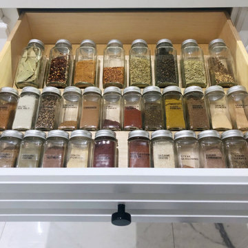 After: Organized Spice Drawer with Labeled Jars