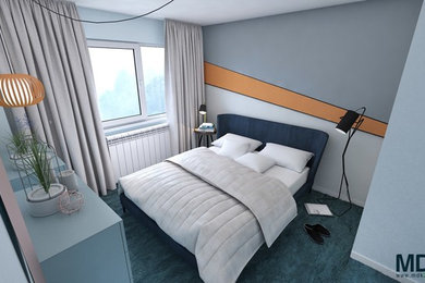 他の地域にあるインダストリアルスタイルのおしゃれな寝室 (青い壁、カーペット敷き、ターコイズの床)