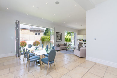 This is an example of a contemporary dining room in London.