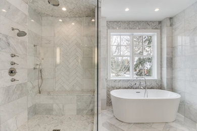 Inspiration for a transitional master gray tile and marble tile marble floor and gray floor bathroom remodel in Detroit with a hinged shower door