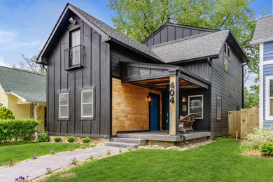 Example of a mid-sized mountain style home design design in Indianapolis