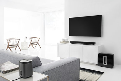 Example of a trendy family room design in San Diego