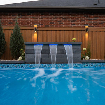 Modern Backyard Renovation with Pool, Composite Deck & Aluminum Pergola