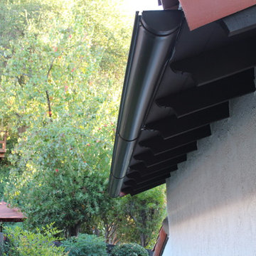 Half Round Rain Gutters with Wrap Around 10 Gauge Twisted Rafter Mount Brackets