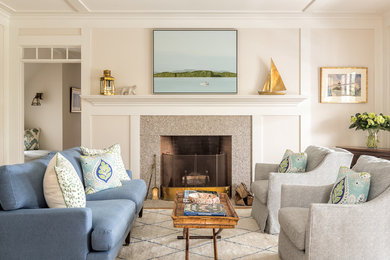 Inspiration for a beach style formal enclosed living room in Portland Maine with a standard fireplace, a stone fireplace surround and beige walls.