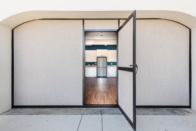 Example of a minimalist attached garage workshop design in Los Angeles