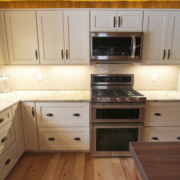 Log Cabin Rustic White Kitchen Cabinets with Granite and Wood Countertops