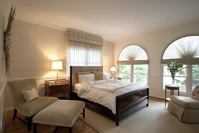 Inspiration for a timeless bedroom remodel in DC Metro with beige walls
