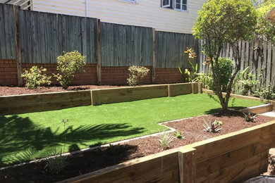 Design ideas for a small and australian native contemporary backyard formal garden in Brisbane.