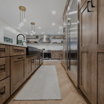 Warm Cherry Kitchen and Powder Room Remodel with Waterfall Island in Herndon, VA