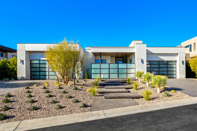 Contemporary gray one-story house exterior idea in Las Vegas