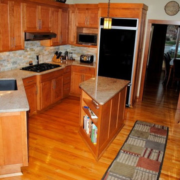 Stacked Stone Tile Backsplash and Millennium Cream Granite