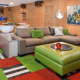 Photo of a large midcentury walk-out basement in Atlanta with beige walls and lino flooring.