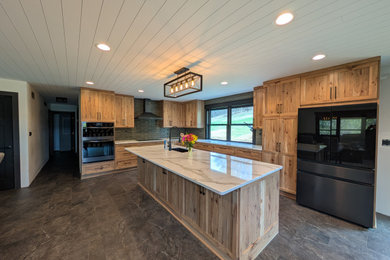 Mid-sized transitional l-shaped eat-in kitchen photo in Other with light wood cabinets, quartz countertops and an island