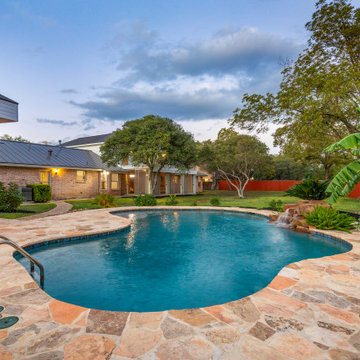 Freeform Pool with Stacked Boulder Waterfall in Castle Hills, TX
