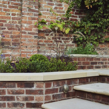 Stone/ brick etc landscape elements.