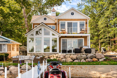 Example of an arts and crafts exterior home design in Other